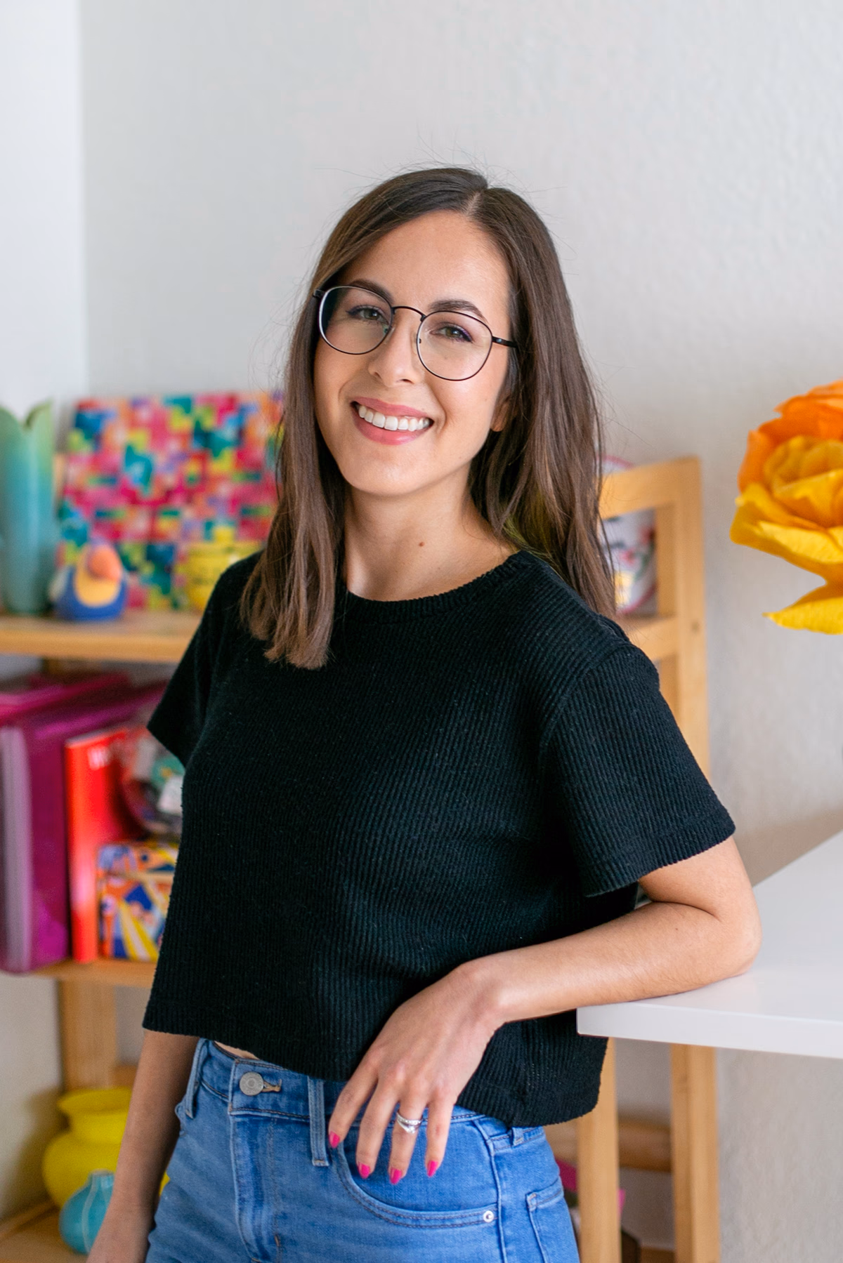 A photo of Christine Maggi in her home office.